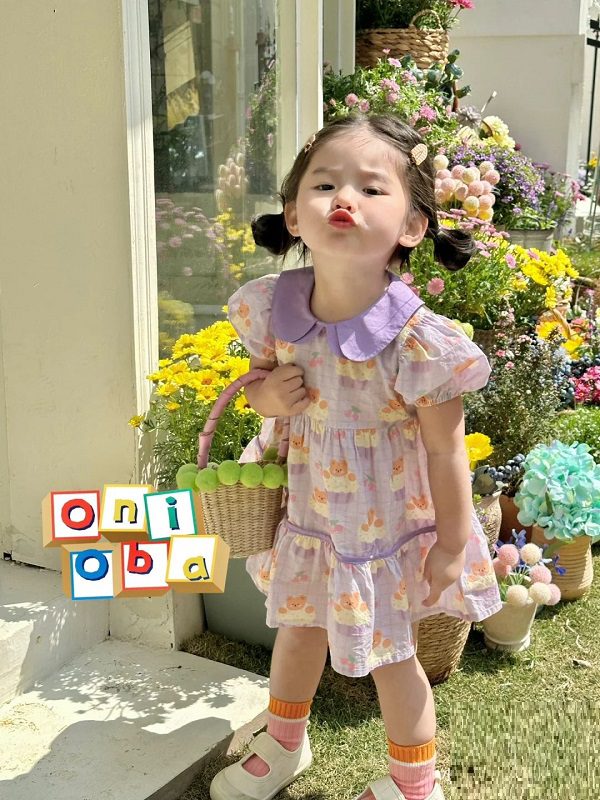 Bé cười rạng rỡ trong buổi chụp ảnh